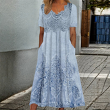 INDIGO | ELEGANTIŠKA MIDI GĖLINĖ SUKNELĖ