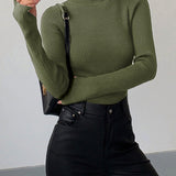 Isla | Rafinuotas ir Universalus Ribo Turtleneck Megztinis