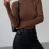 Isla | Rafinuotas ir Universalus Ribo Turtleneck Megztinis